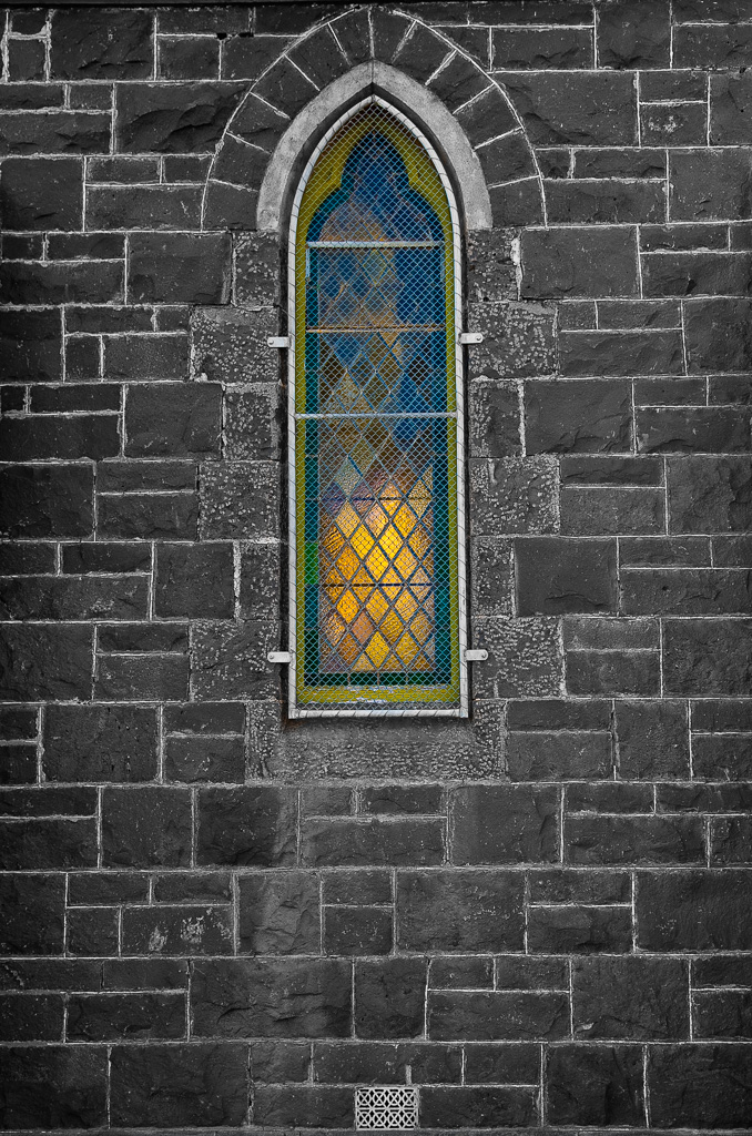 Something about stained glass behind wire mesh makes a real coment (mostly on society. This image is obviously heavily manipulated with no pretense othwise. However I though it was appropriate to as way of highlingting how it made me feel.