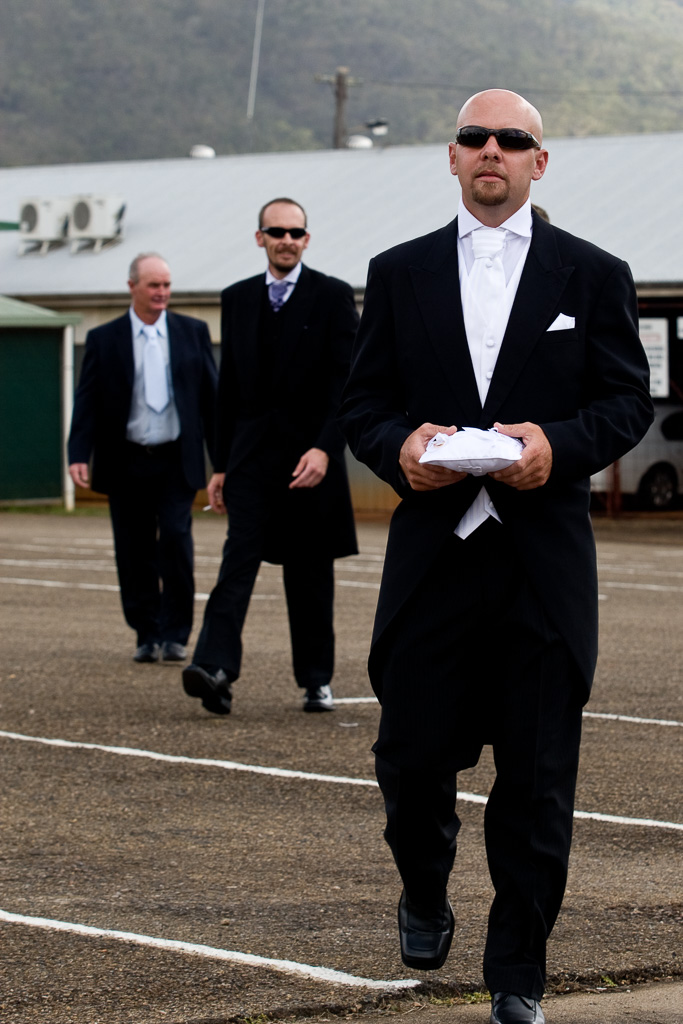 This is a picture of my father and brothers on my youngest brother''s wedding day. I like this picture a because it is family but also for the symetry of the composiation. Wish I could say it was planned but it was a chance shot walking backwards as we headed to the church.